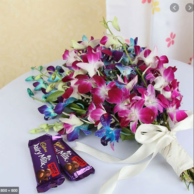 Orchid Bouquet with Dairy Milk Chocolates