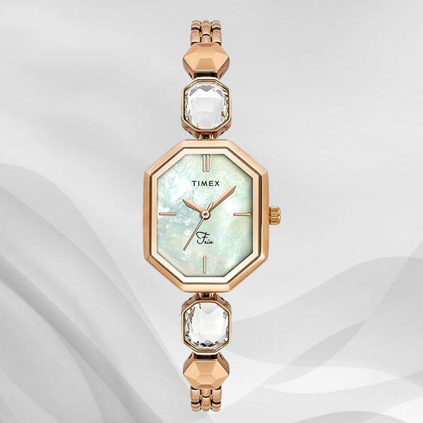Rose gold Timex ladies' watch with an octagonal bezel and crystal-link bracelet on a pale background.