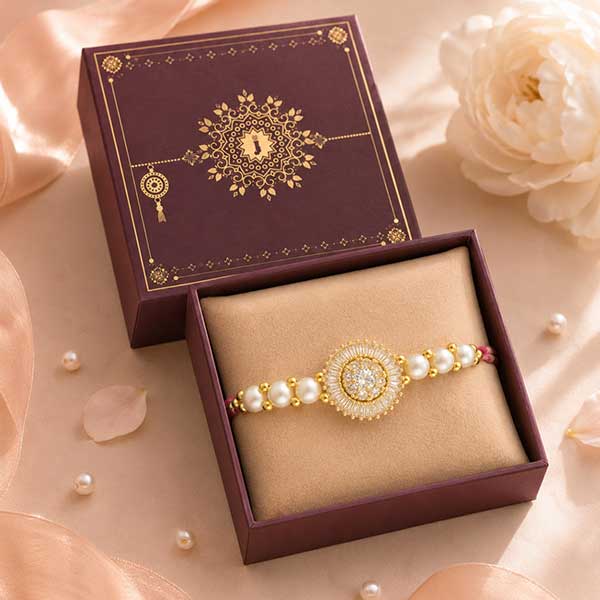 Pearl CZ Sunburst Gold Rakhi Bracelet