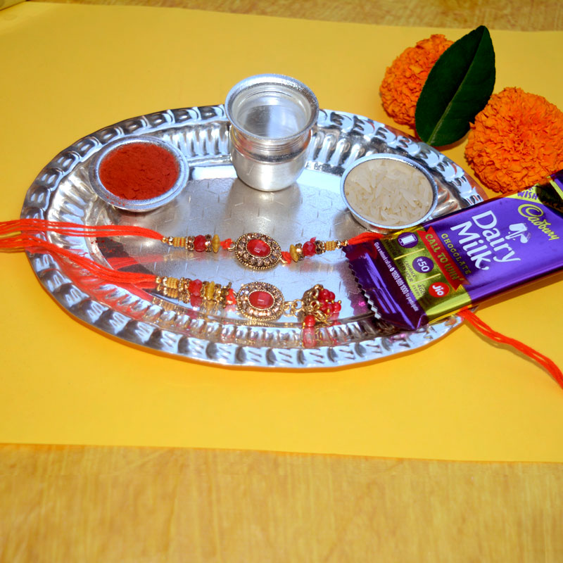 Oval Silver Rakhi Thali with Bhaiya Bhabhi Rakhi