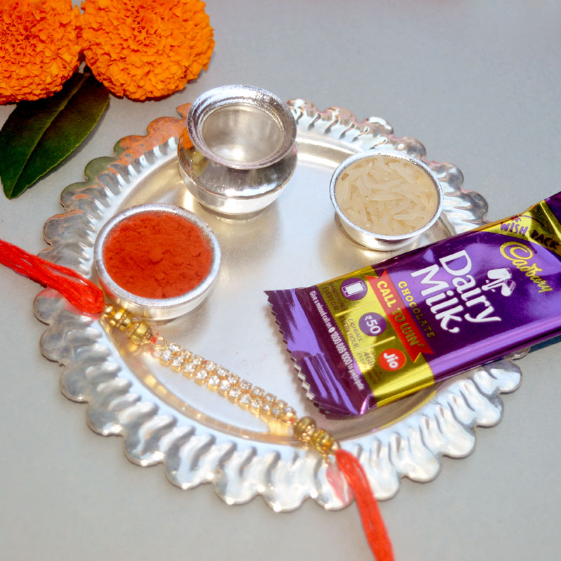 Rakhi Silver Surya Thali with Dairy Milk