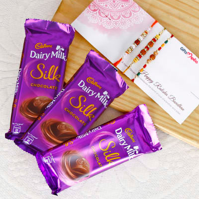 Three Rakhis with 3 Dairy Milk Silk Chocolates