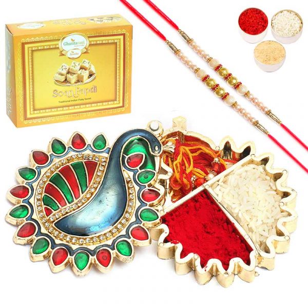Round Peacock Roli Chawal Box with 2 Pearl Rakhis With Soan Papdi
