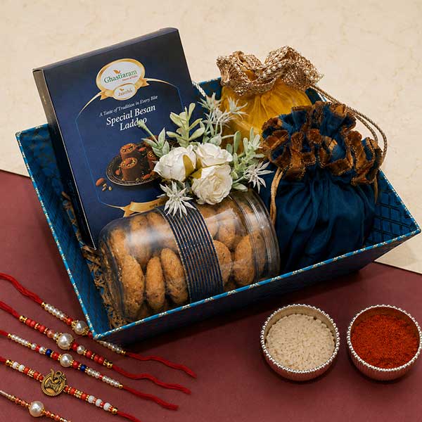 Perfect Hamper of Besan Laddoo, Sweet Pouches, Namkeen and Dryfruit With 5 Rakhis