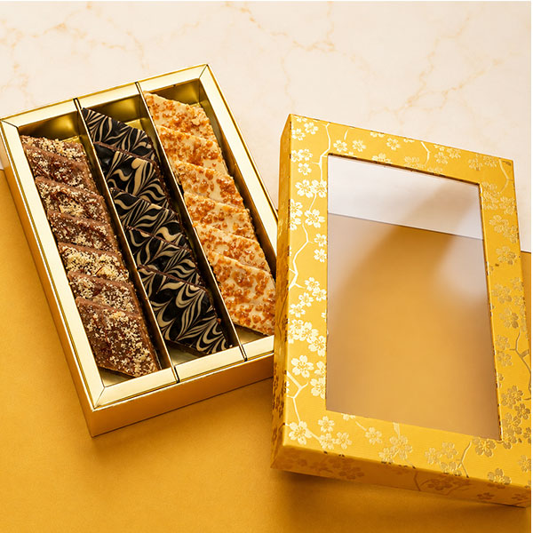 Gift box of Hazelnut Katli, Caramel Katlis and Chocolate Kaju Katli Fusion Sweets
