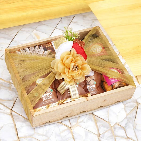 Wooden tray of Kaju Katli, Mewa Bites and 2 Jars of Flavour Raisins and Cashews