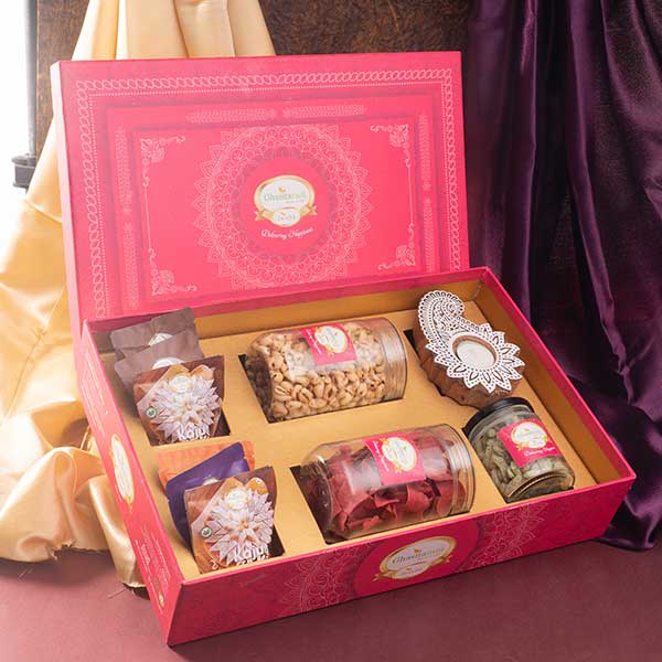 Pink Hamper Box of Sweet namkeen dryfruit and T-light