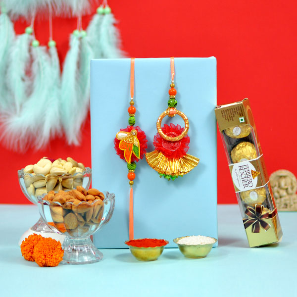 Glorious Rakhi Pair with Chocolate Dry Fruits