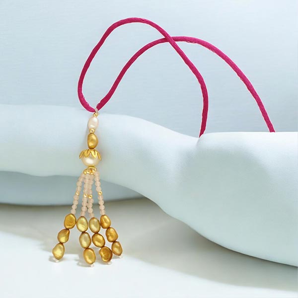 Radiant Matte Gold Lumba Pearl Rakhi