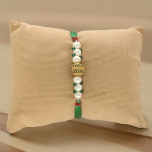 Alluring Gold Plated Pearl Rakhi