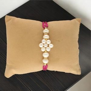 Embossed White Pearl Rakhi for Sweet Bro