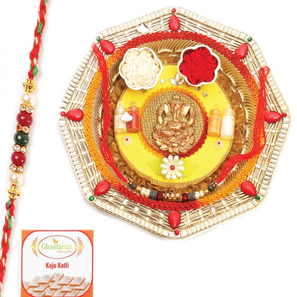 Round Ganesh Pooja Thali With Pearl Rakhi With 200 gms of Kaju katli